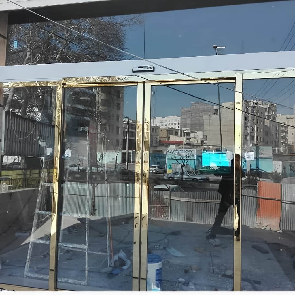 درب شیشه ای اتوماتیک کشویی با شیشه سکوریت شفاف