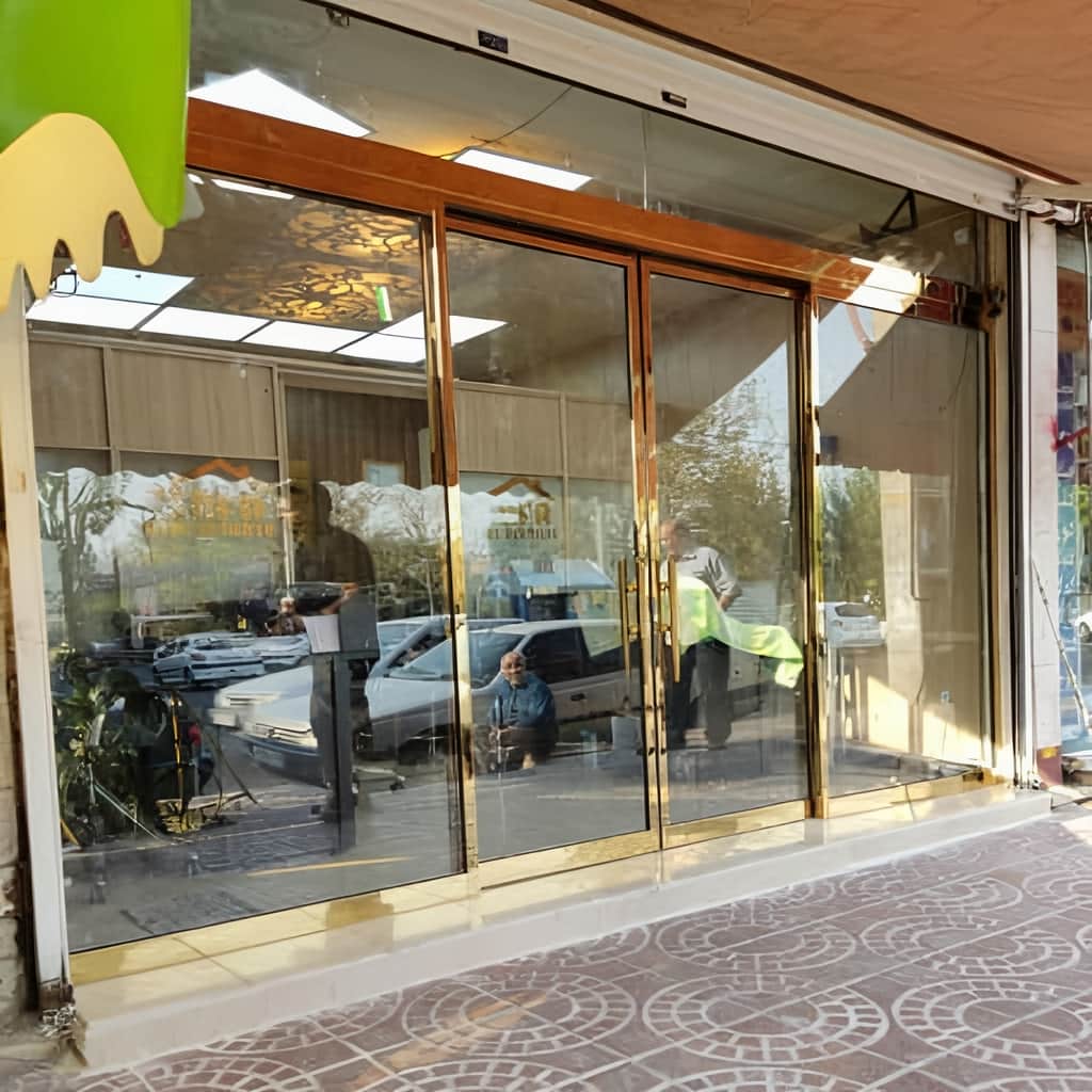 درب اتوماتیک شیشه ای کم صدا با ریل بالایی تراز