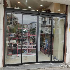 درب اتوماتیک شیشه ای گردان با فریم آلومینیومی ظریف