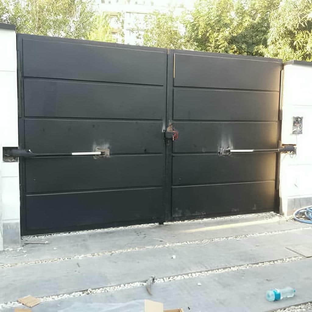 جک درب پارکینگ با اصلاح اتصالات مکانیکی و براکت جک درب پارکینگ با اصلاح اتصالات مکانیکی و براکت