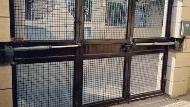 نمای جک لولایی درب پارکینگ روی درب فلزی
