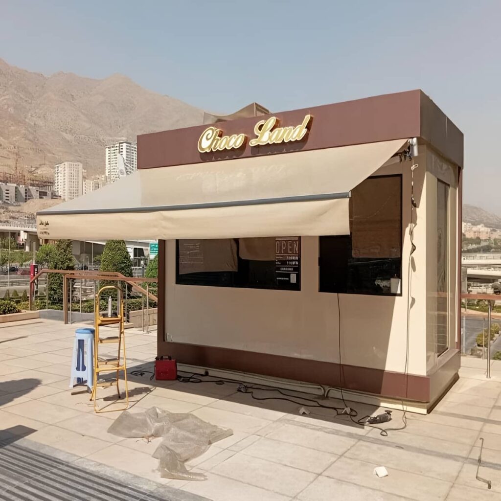 سایبان بازویی با پوشش پارچه ای مناسب تراس مسکونی