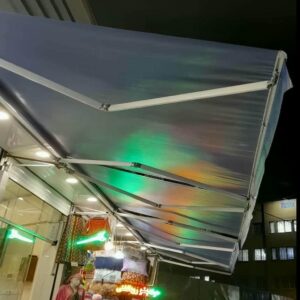سایبان حیاط با موتور و بازوهای هماهنگ