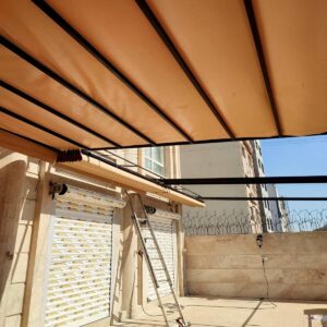 سقف متحرک پارچه ای در مرحله بررسی کیفیت پارچه
