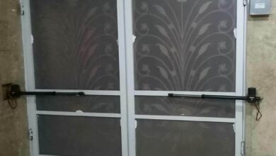 جک درب پارکینگ نصب شده روی درب مسکونی کم صدا