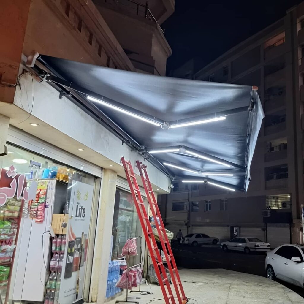 سایبان اتوماتیک خاکستری در ساری برای ورودی فروشگاه