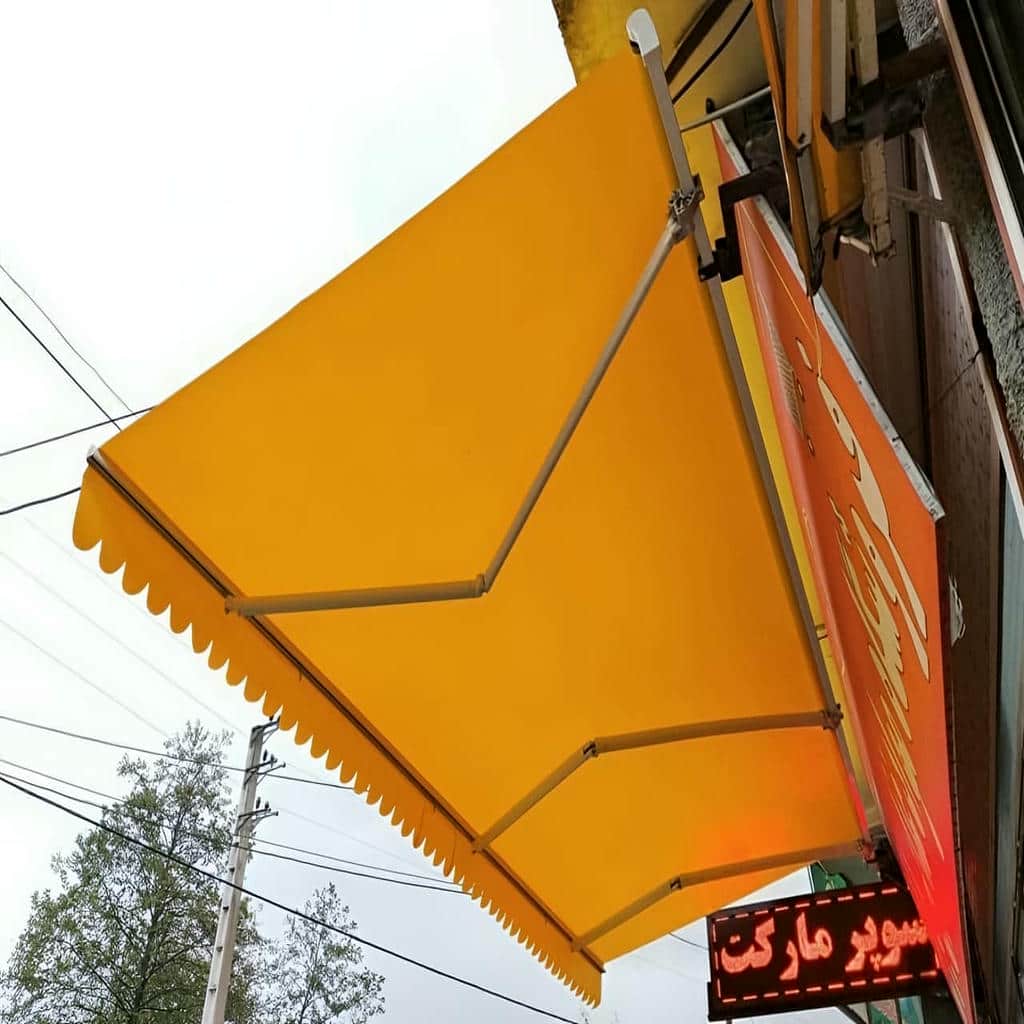 سایبان برقی مشکی در یزد برای ورودی تجاری