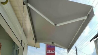 سایبان برقی سفید در زاهدان بالای ورودی ساختمان